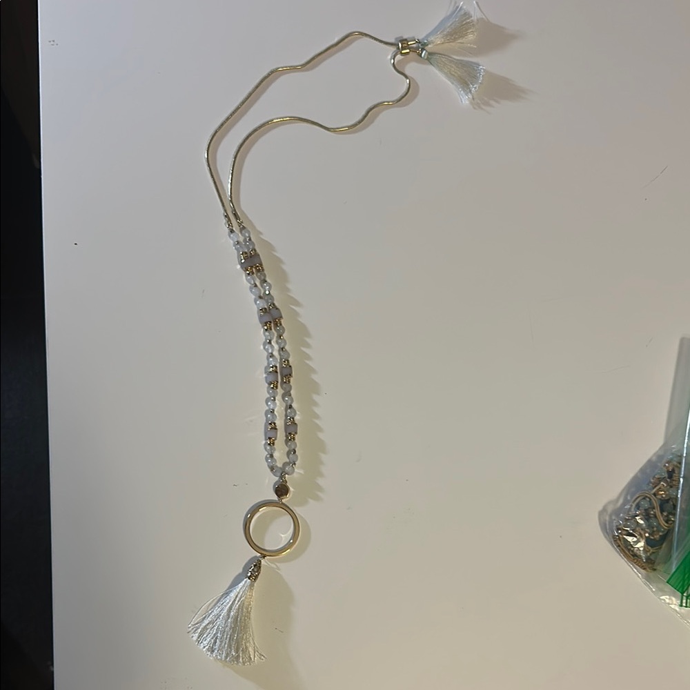Elegant Gold and White Tassel Necklace